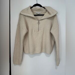 And now this quarter zip sweater